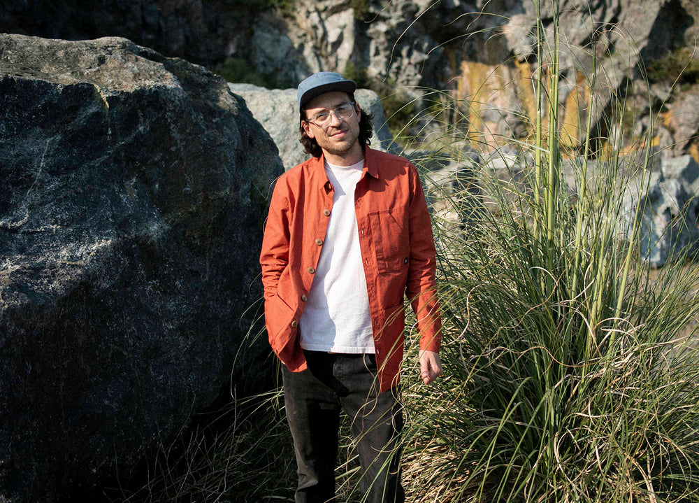 Rust coloured Unisex Overshirt handmade in Britain from weatherproof waxed organic cotton and sustainably sourced natural corozo nut buttons.