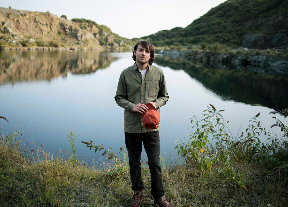 Olive coloured Unisex Overshirt handmade in Britain from weatherproof waxed organic cotton and sustainably sourced natural corozo nut buttons.