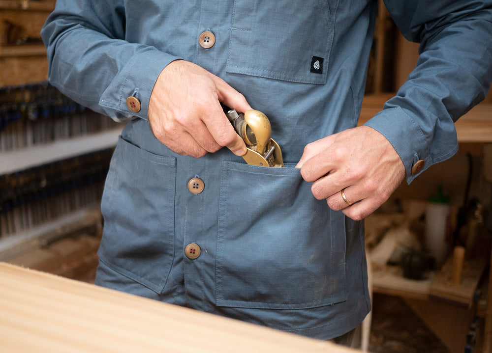 Sky Blue Unisex Overshirt handmade in Britain from weatherproof waxed organic cotton and sustainably sourced natural corozo nut buttons.