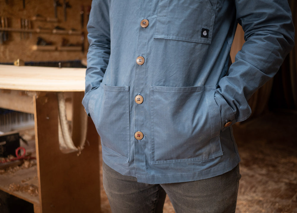 Sky Blue Unisex Overshirt handmade in Britain from weatherproof waxed organic cotton and sustainably sourced natural corozo nut buttons.