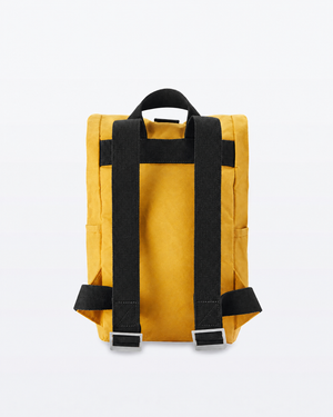 Back of the Roll Top Mini in Mustard showing black webbing shoulder straps