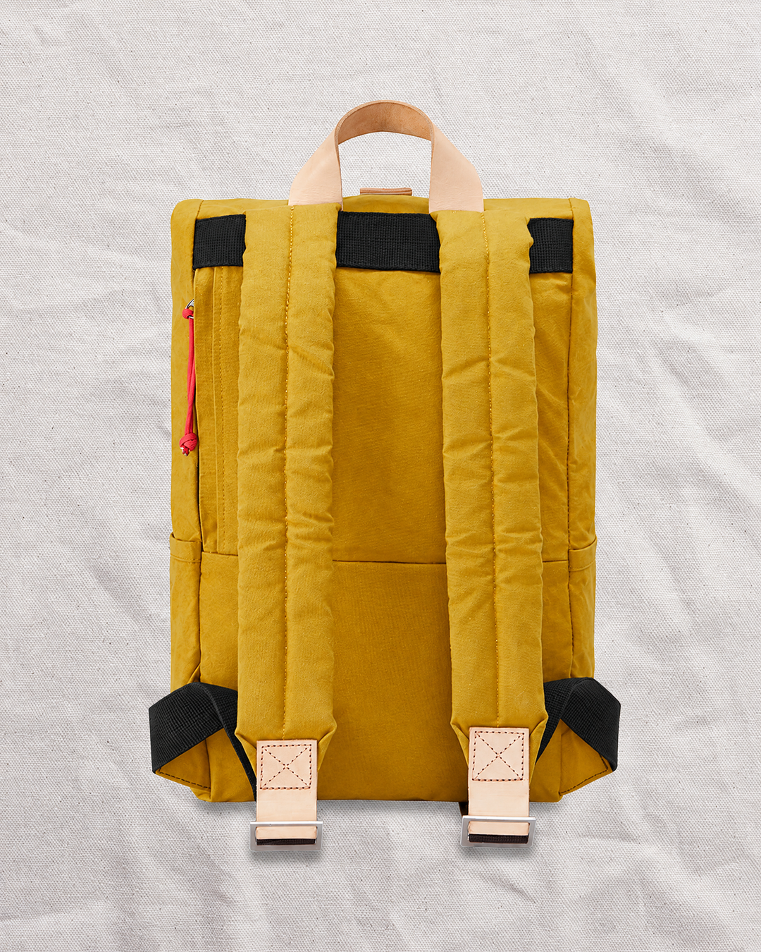 Back of the Mustard roll top backpack with padded shoulder straps, UK made and handmade to order