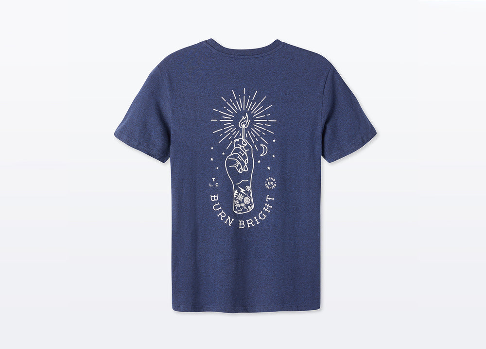 Navy Blue Unisex T-shirt made with sustainable organic cotton. Large Design printed in off white on back reading Burn Bright under drawn hand holding a lit match