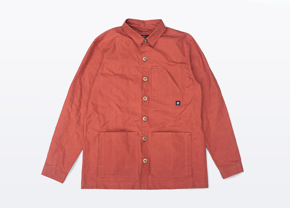 Rust coloured Unisex Overshirt handmade in Britain from weatherproof waxed organic cotton and sustainably sourced natural corozo nut buttons.